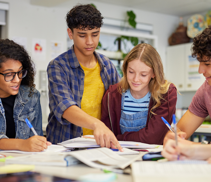 young people interacting in a classroom