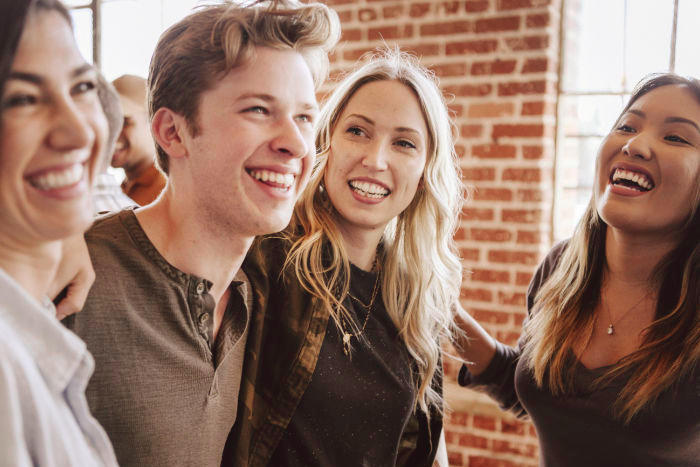 Group of young people laughing