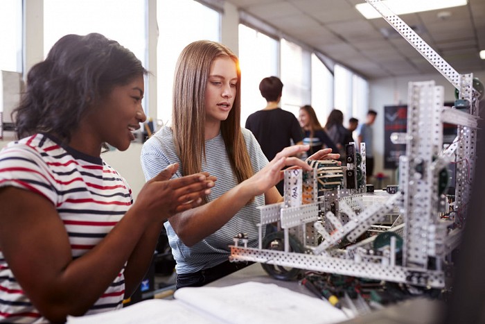 Two girls in science room
